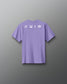 Purple t-shirt with white icons on the back against a gray background