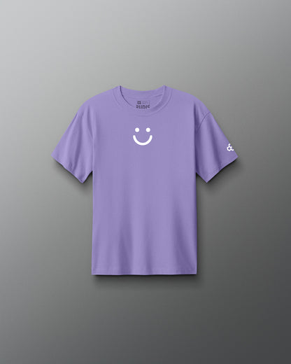 Purple t-shirt with a smiley face design on a gray background
