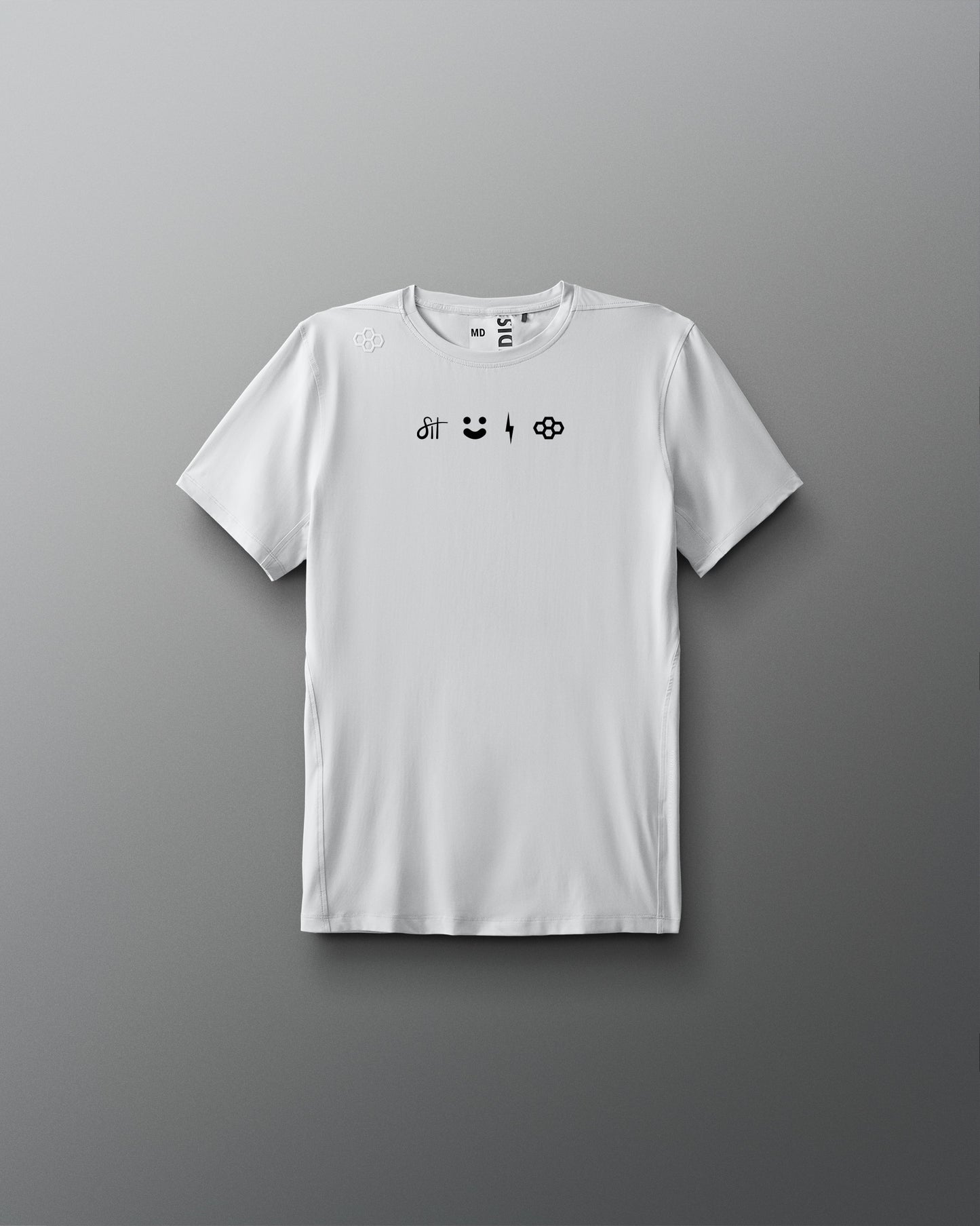 White t-shirt with black graphic designs on a gray background
