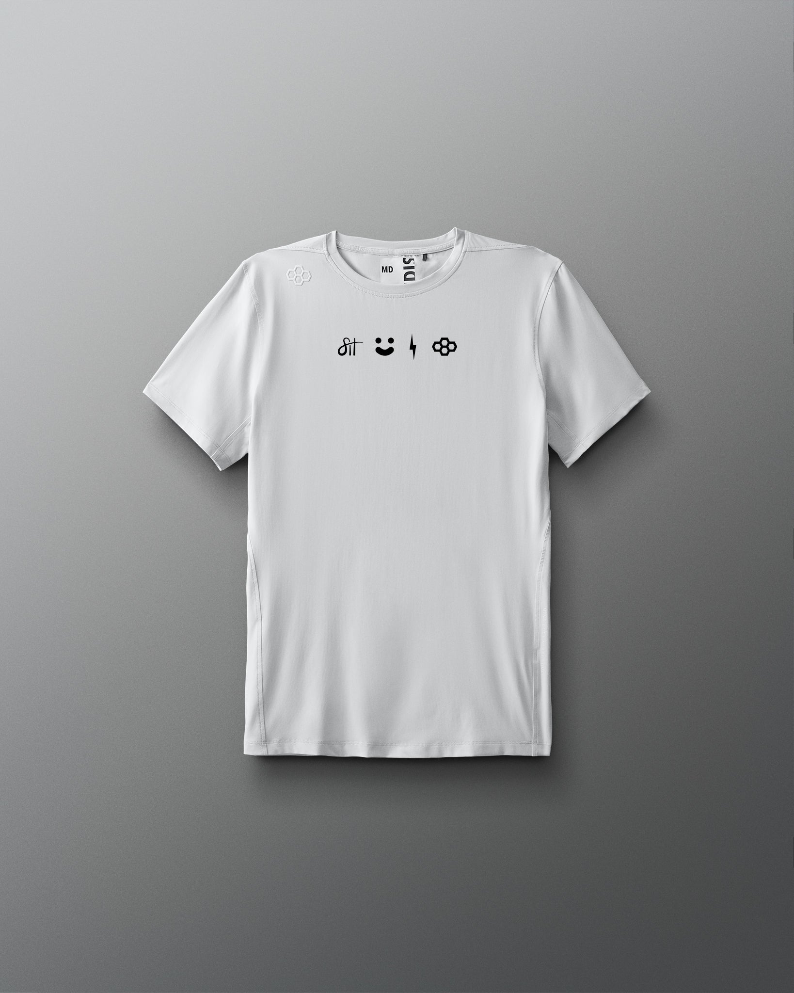 White t-shirt with black graphic designs on a gray background