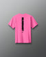 Pink t-shirt with 'Hilderbrandt' logo on the back against a gray background