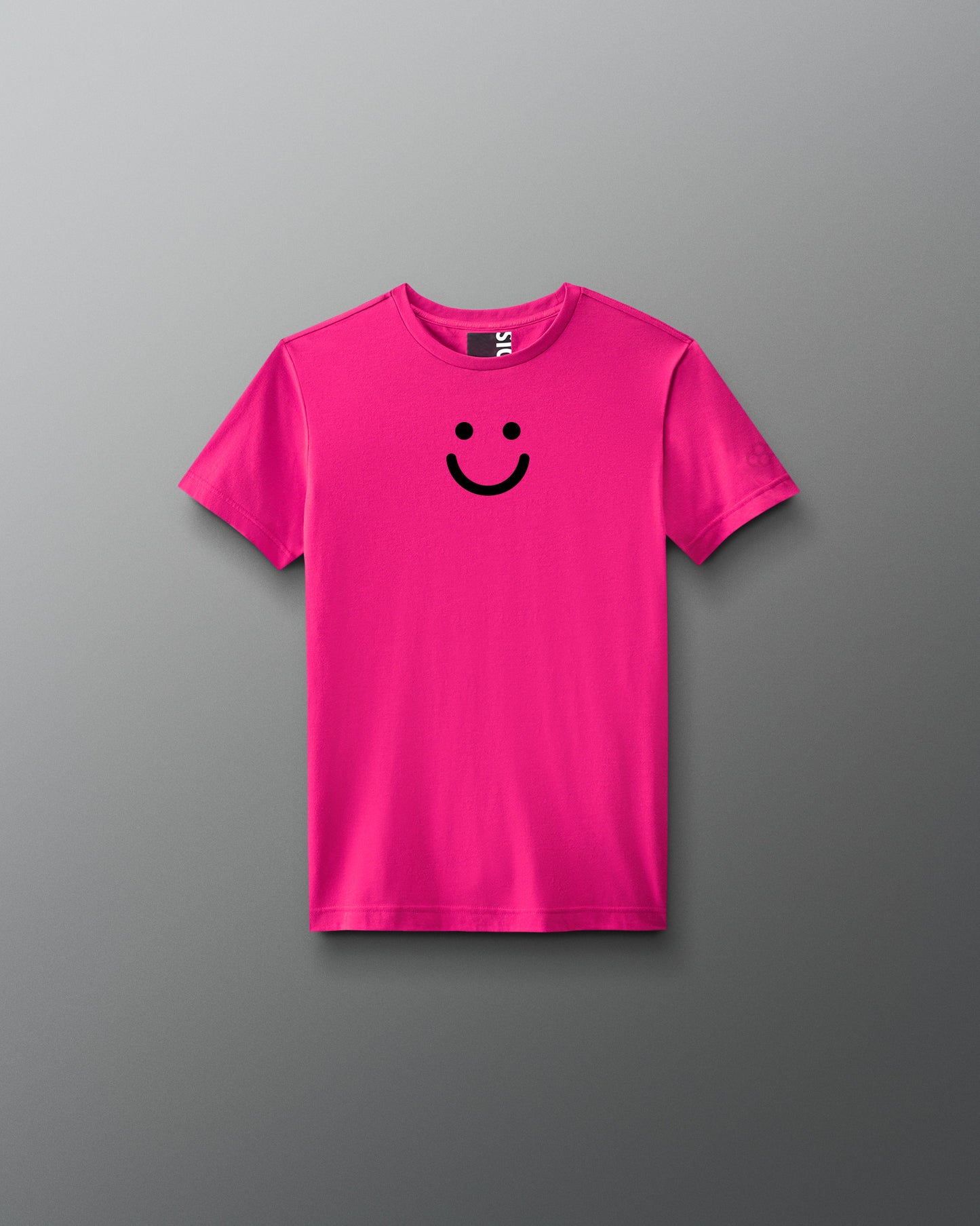 Pink t-shirt with a black smiley face on a gray background