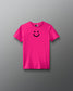 Pink t-shirt with a black smiley face on a gray background