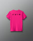 Pink t-shirt with black symbols on the back against a gray background
