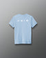 Light blue t-shirt with white icons on the back against a gray background