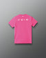 A bright pink short-sleeve t-shirt shown from the back, featuring four small white graphic symbols across the upper back, displayed on a clean gray gradient background.
