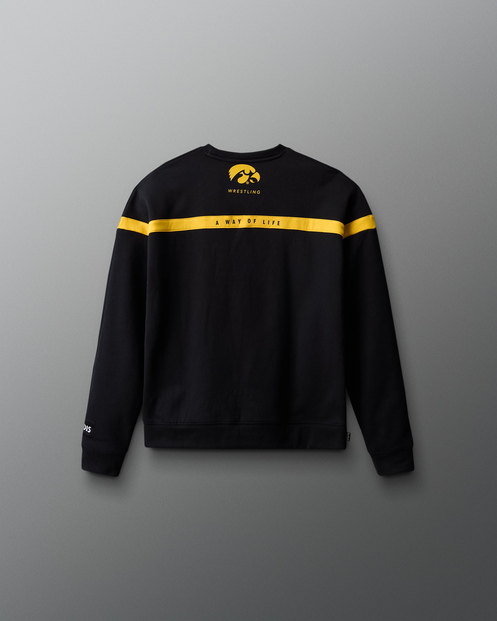Black sweatshirt with yellow accents on a gray background