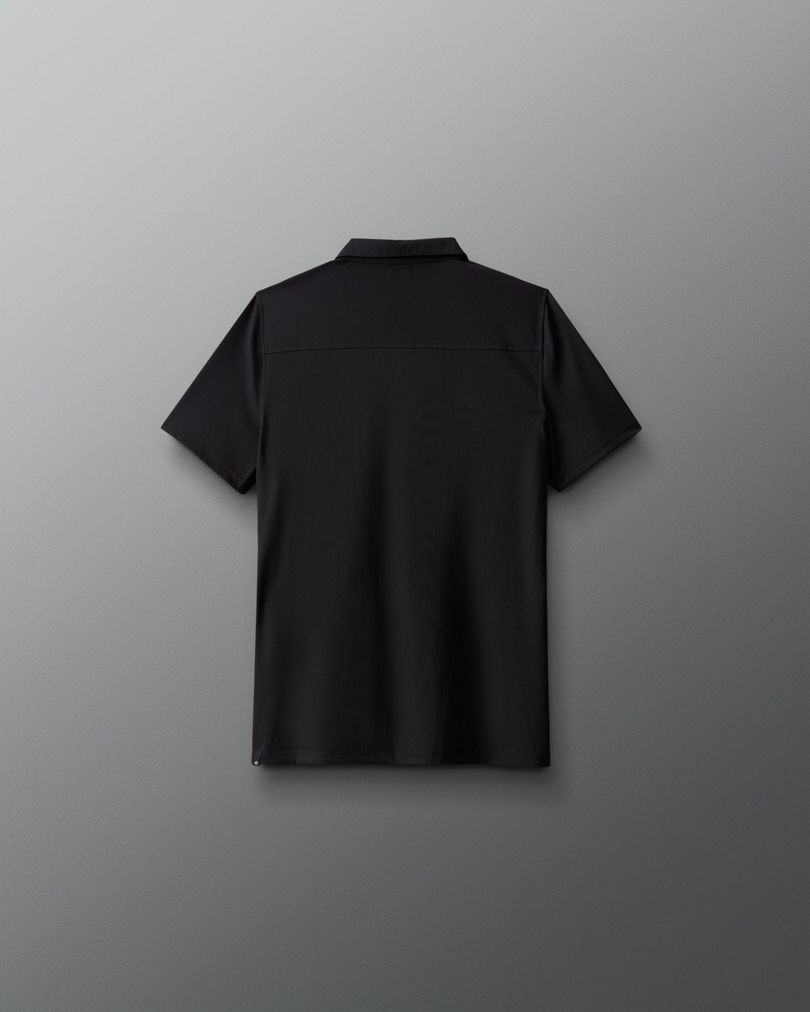 Black shirt on a gray background