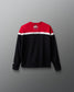 Black and red sweatshirt with white accents on a gray background