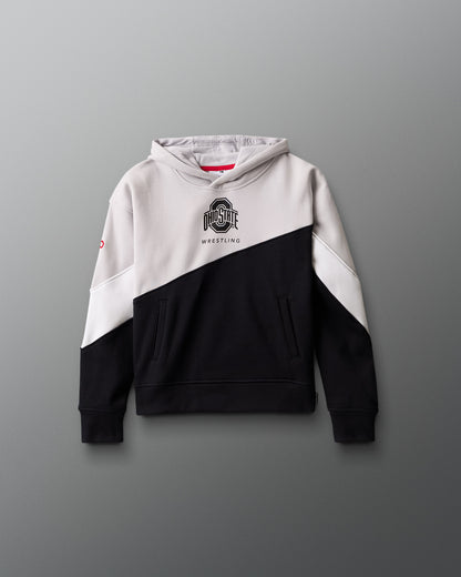 Two-tone black and white hoodie with a logo on a gray background