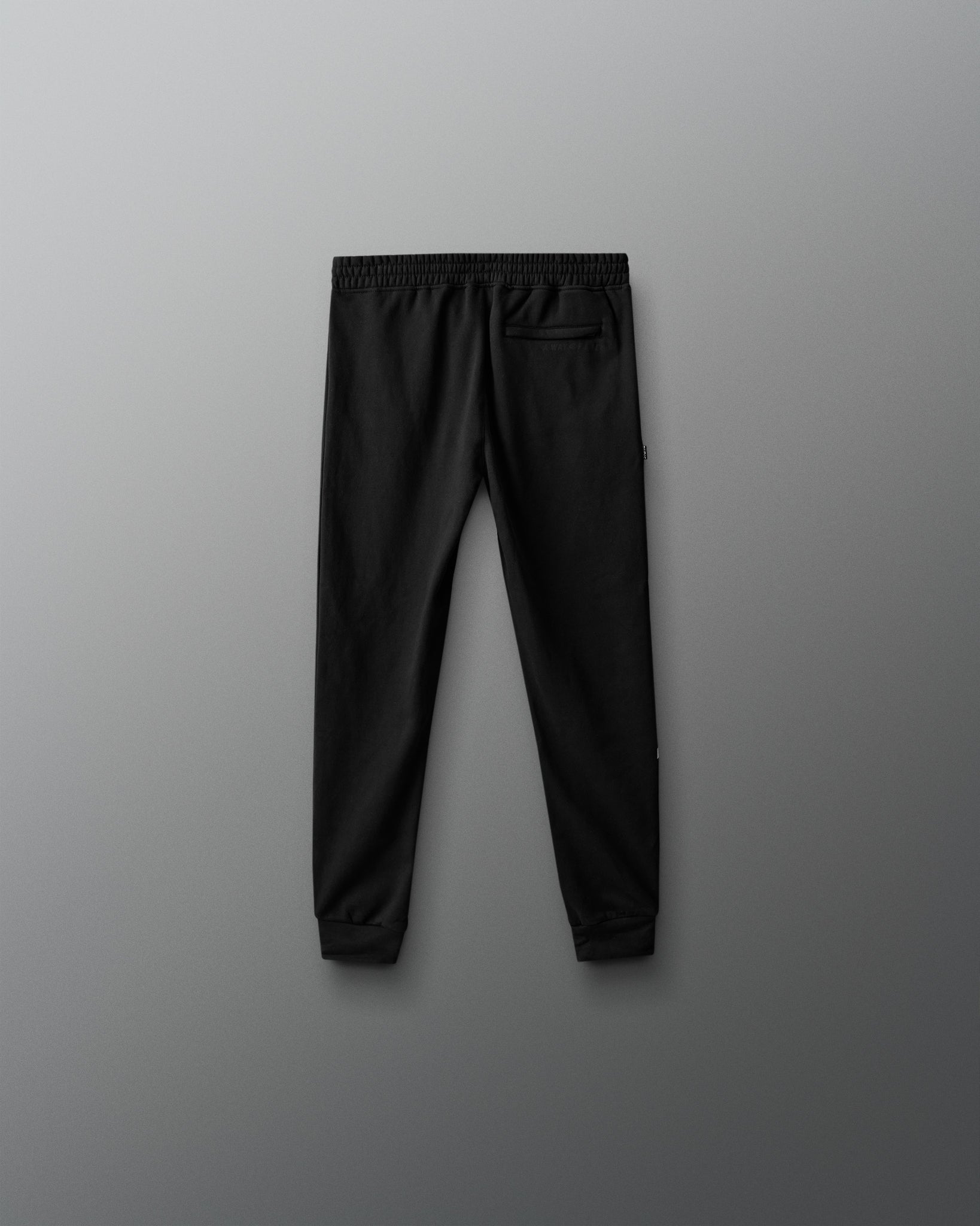 Black pants on a gray background
