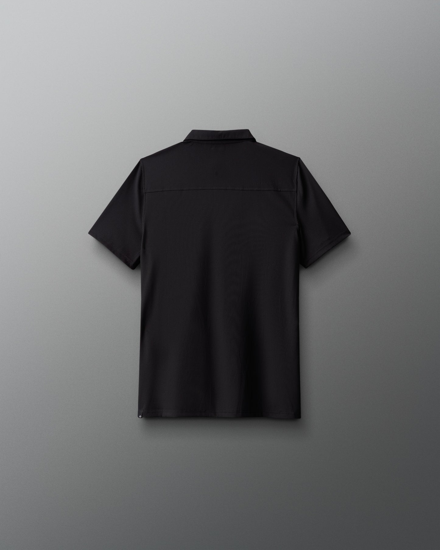 Black shirt on a gray background