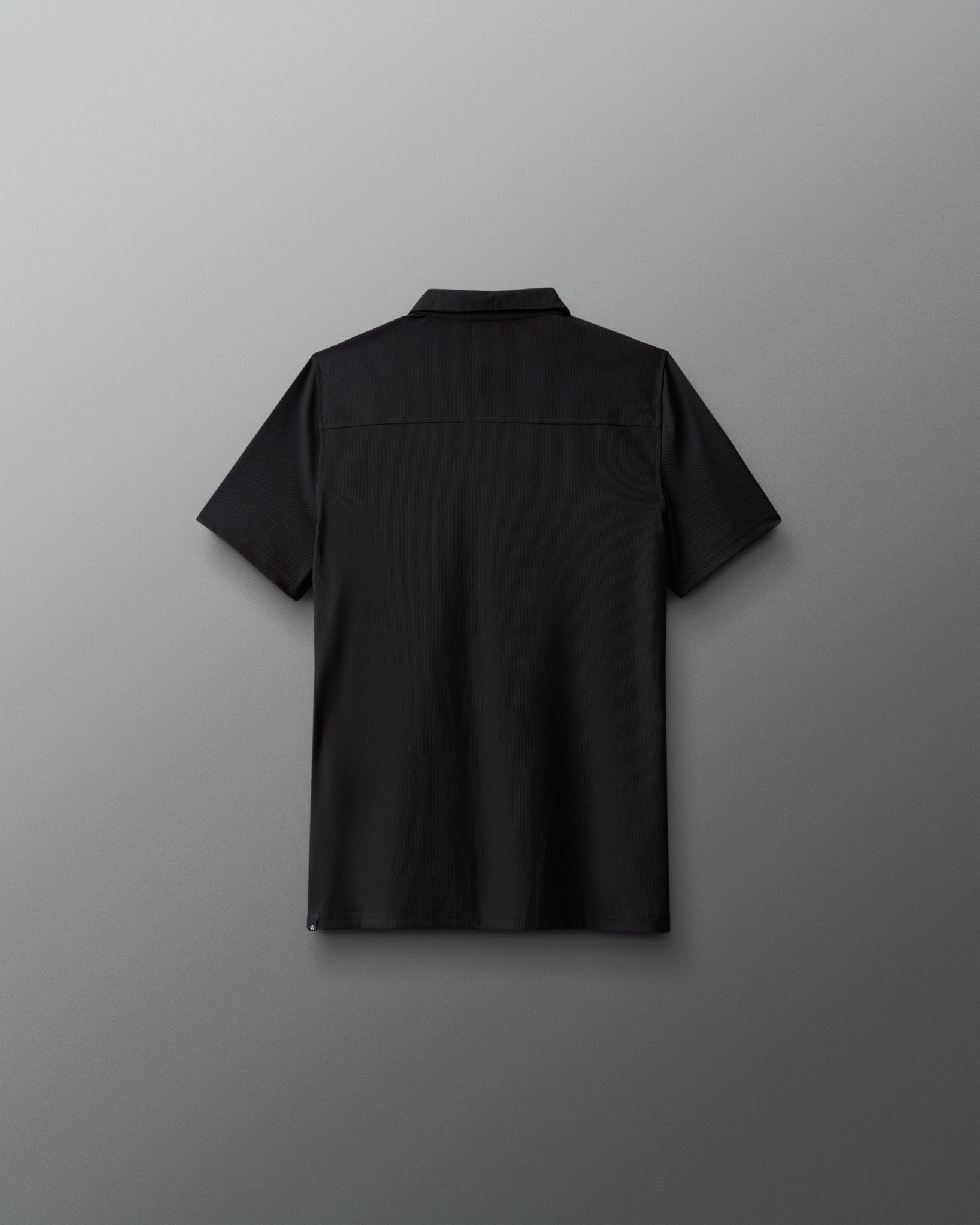 Black shirt on a gray background