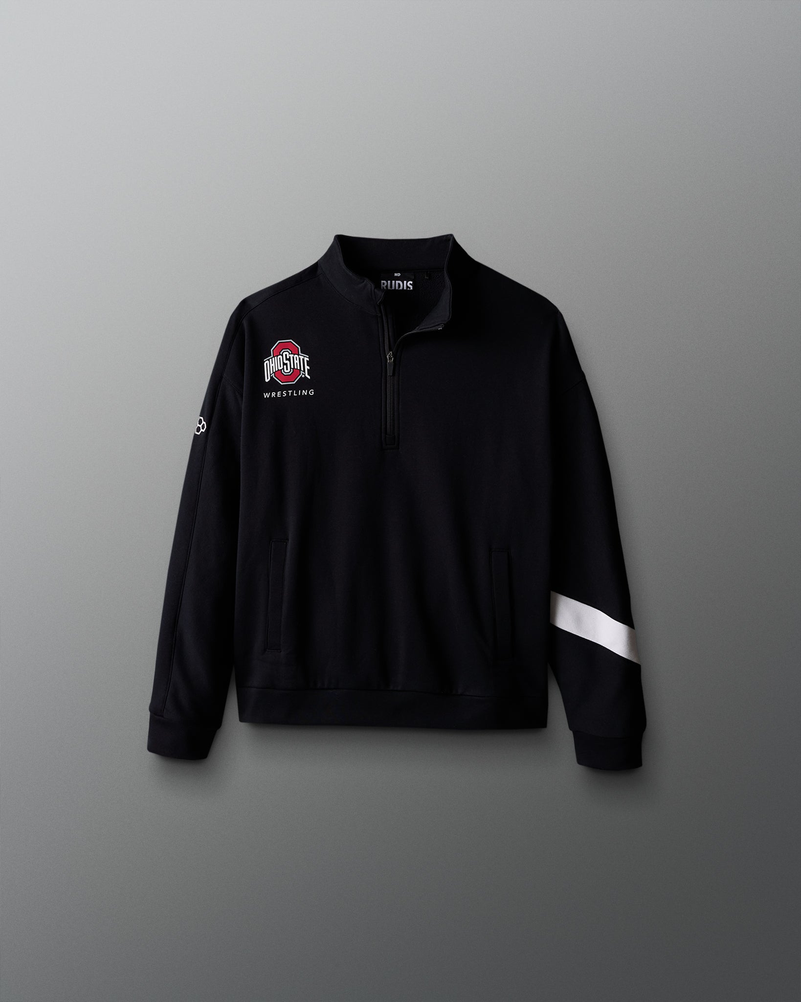 Black quarter-zip sweatshirt with logos on a gray background