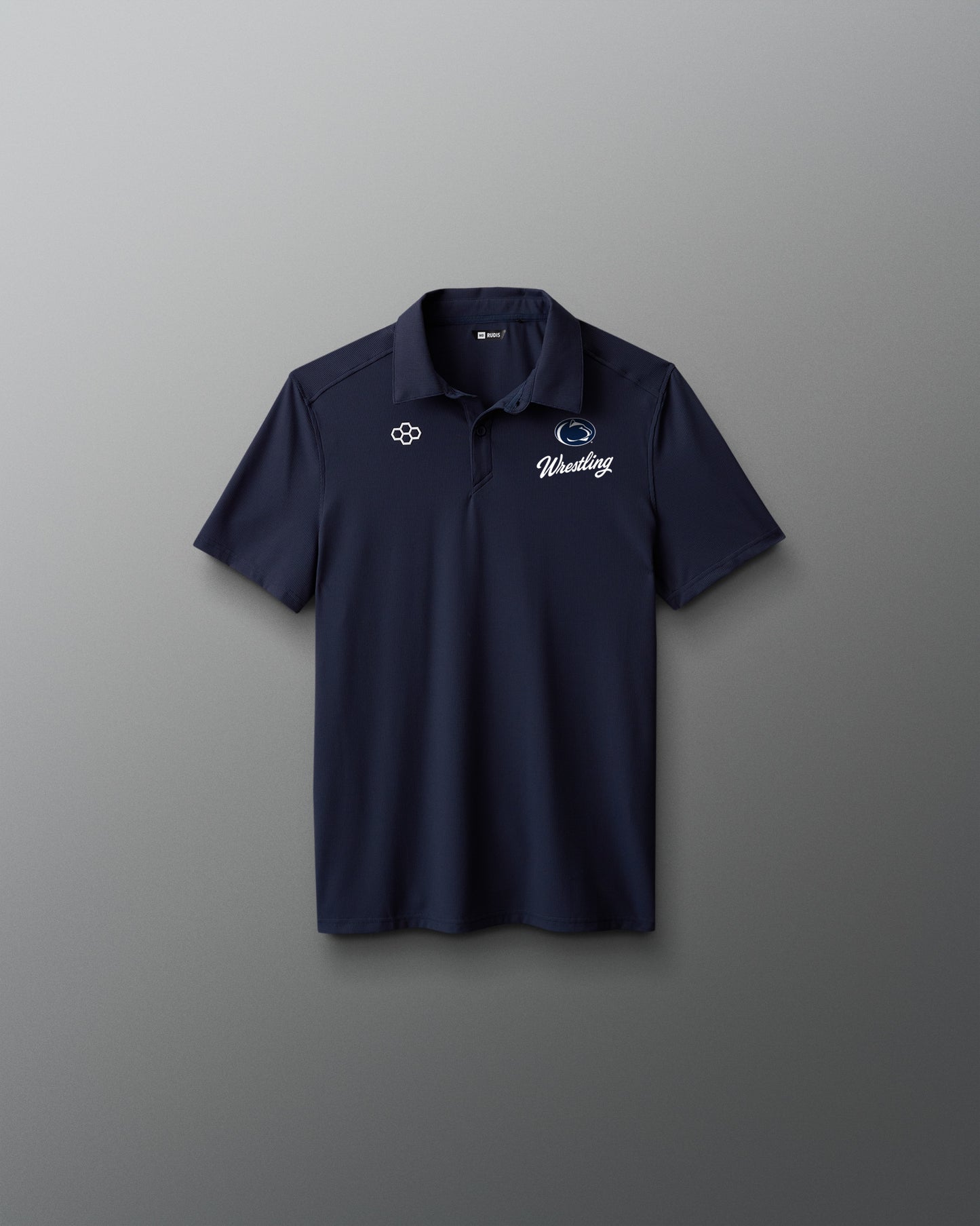 Navy polo shirt with logos on a gray background
