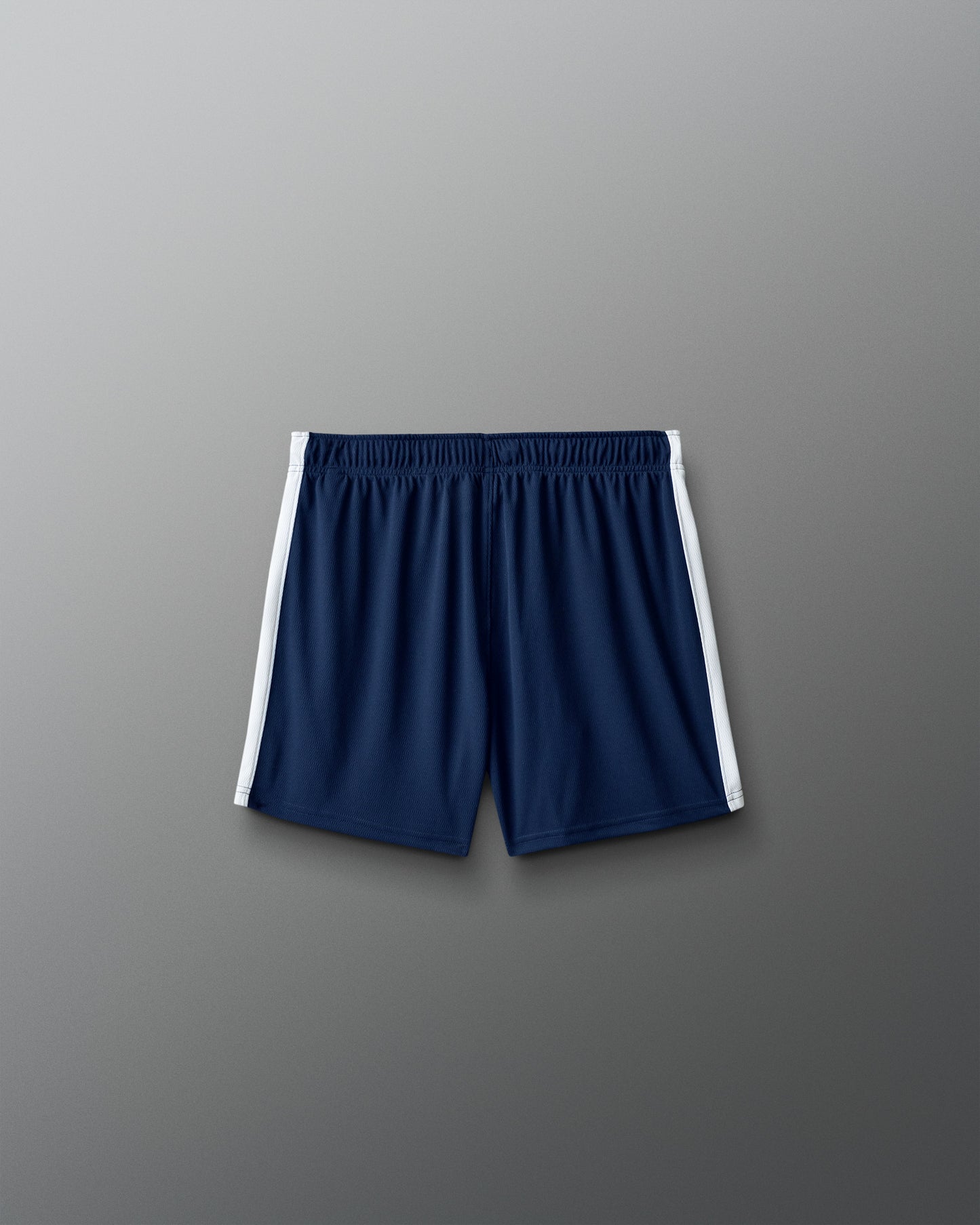 Navy shorts with white trim on a gray background