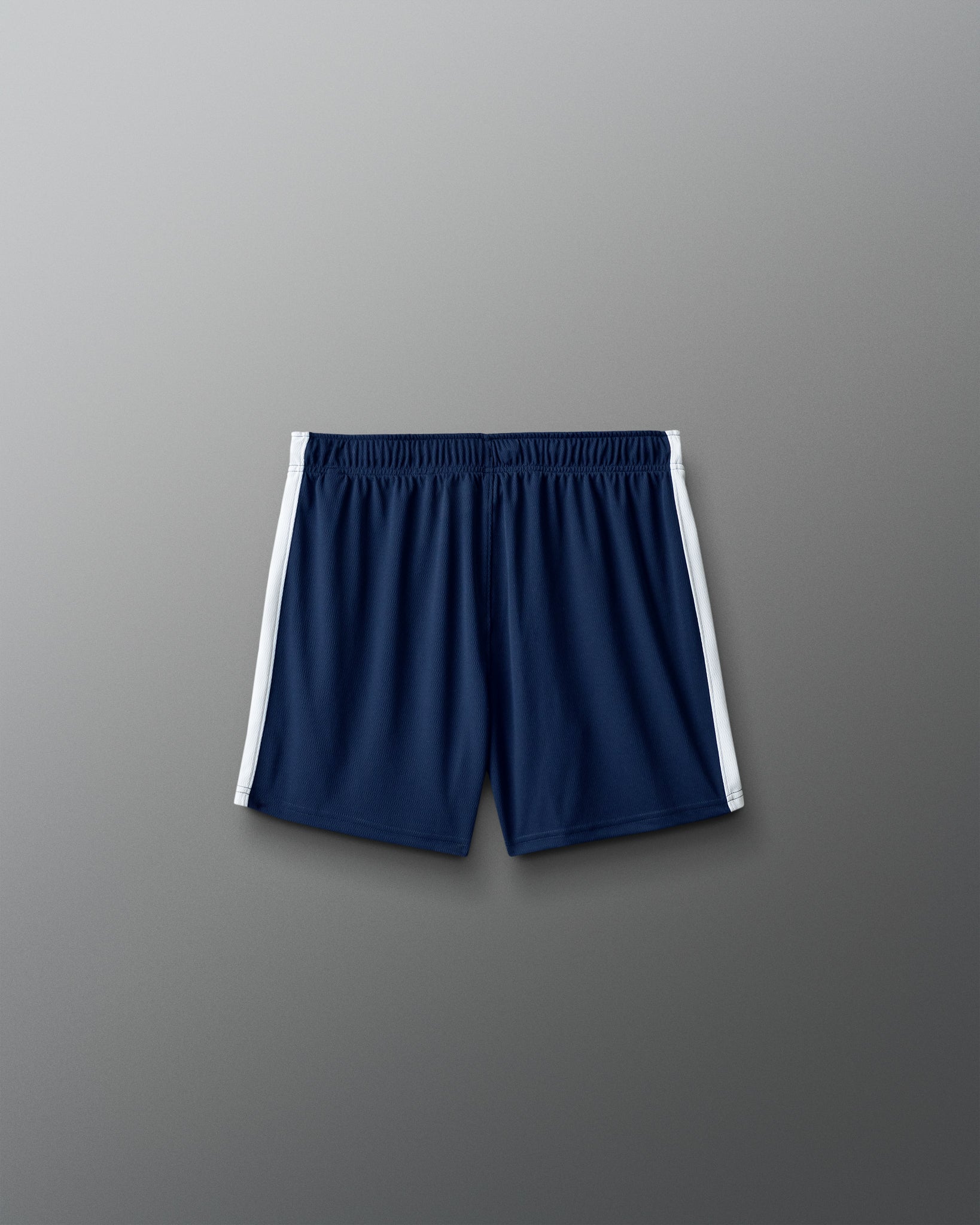 Navy shorts with white trim on a gray background