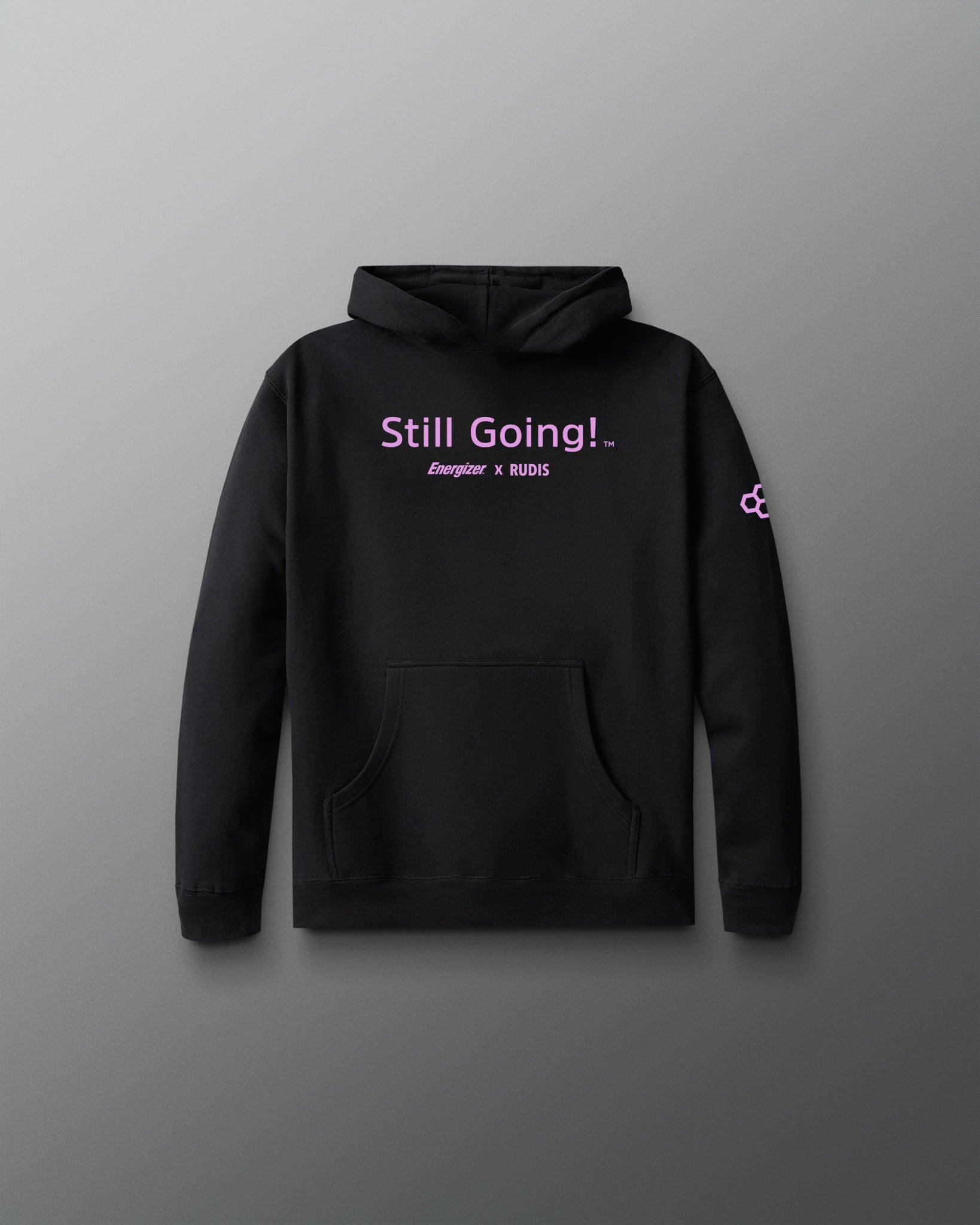 Black hoodie with 'Still Going!' text on a gray background