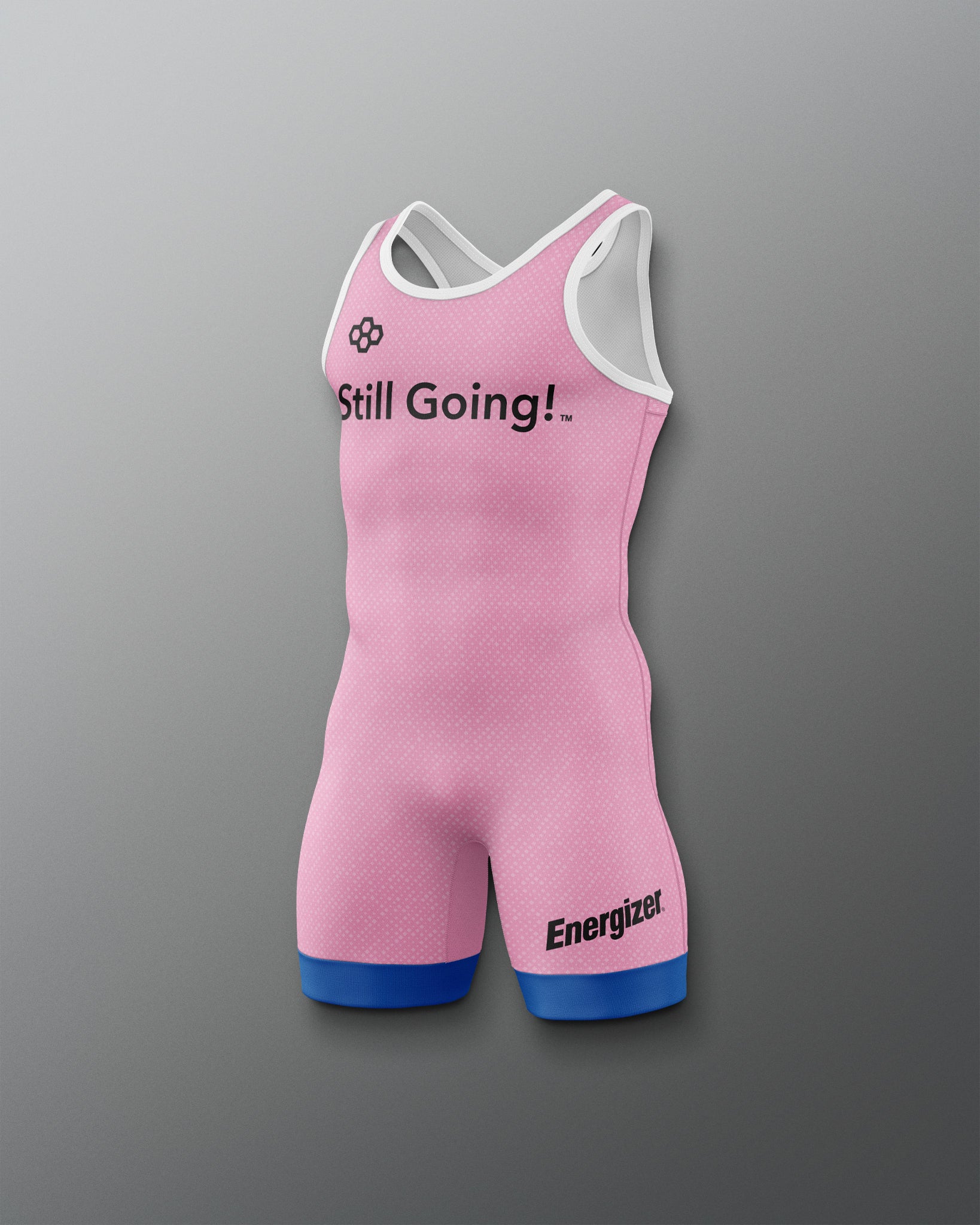 Pink athletic suit with 'Still Going!' text and Energizer logo on a gray background