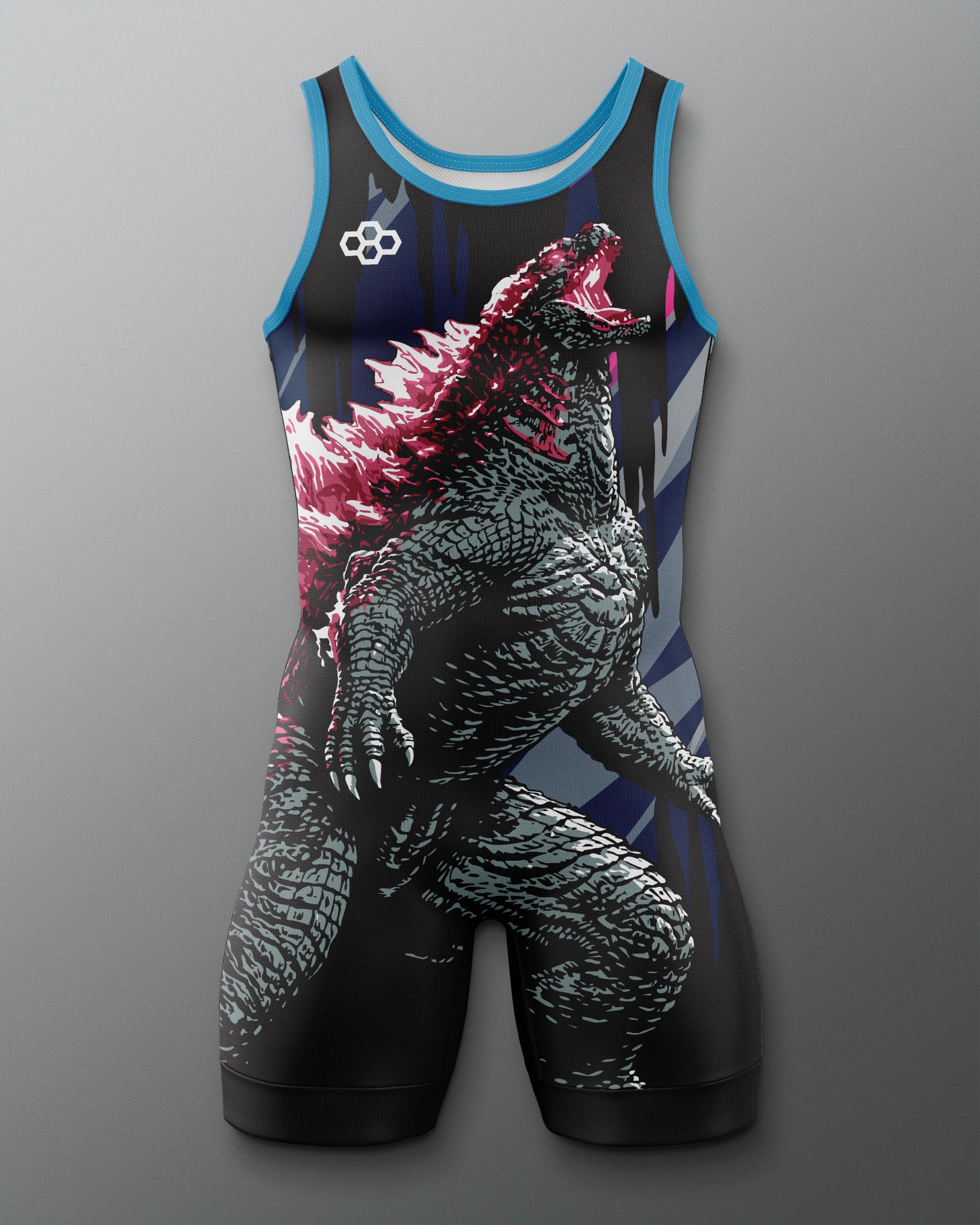 A sleeveless wrestling singlet with a large Godzilla graphic print, featuring a black body with blue trim, a pink and white Godzilla design, and a white Olympic rings logo on the chest, shown against a gray gradient background.