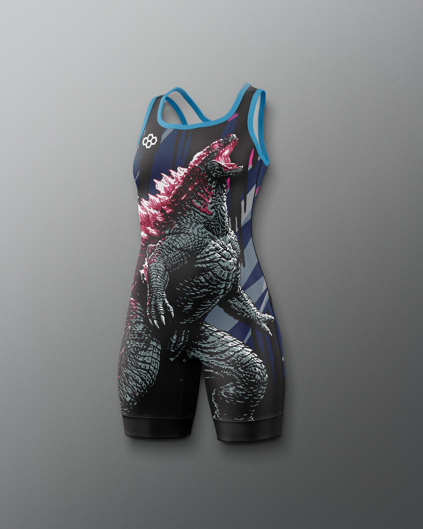 A sleeveless athletic wrestling singlet with a large Godzilla graphic print, featuring a black and gray monster design with pink spikes and blue trim, shown against a gray gradient background.