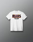 A white short-sleeve crewneck t-shirt with a graphic on the chest reading 'RUDIS' in a fiery textured font and 'GODZILLA-KONG THE new empire underneath, displayed on a clean gray gradient background.