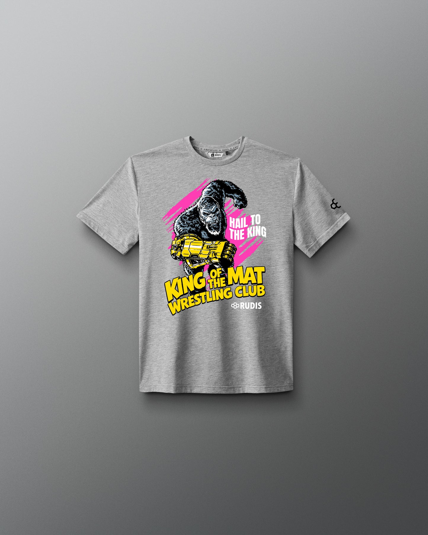 A heather gray short-sleeve t-shirt with a graphic print of a gorilla wearing a yellow crown, set against a pink and yellow background with the text 'HAIL TO THE KING', 'KING OF THE MAT', and 'WRESTLING CLUB'.