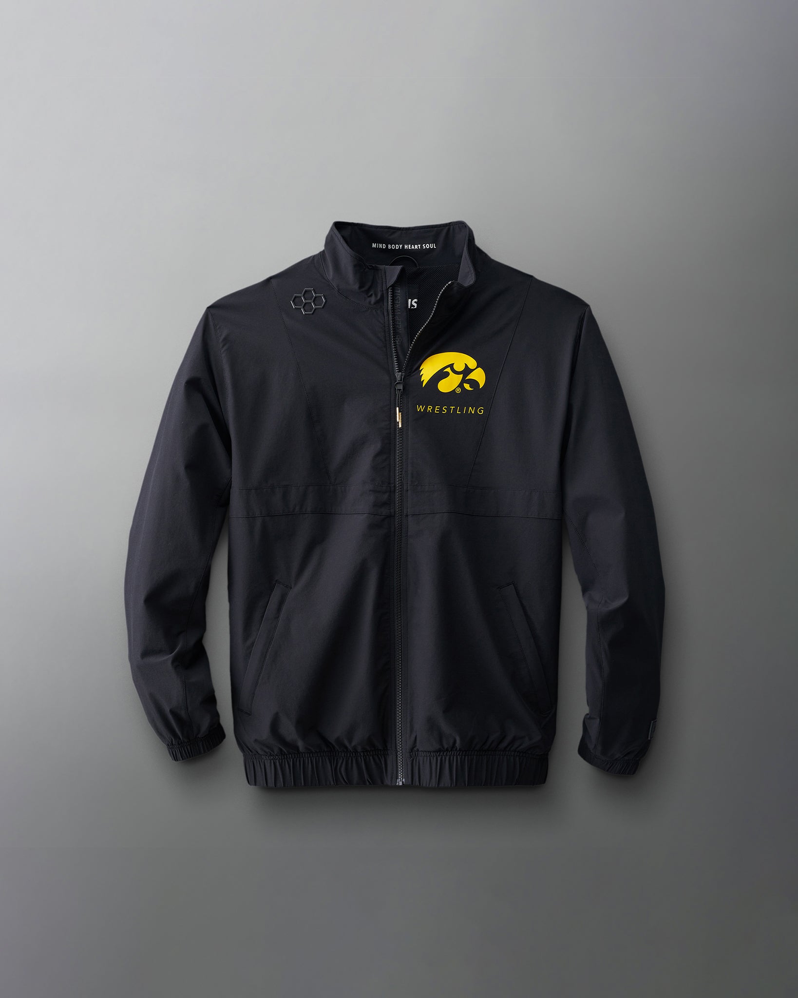 Youth-sized black jacket with the 'IOWA' text and a graphic emblem on the front side, displayed against a grey background. iowa hawkeyes wrestling 