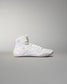 High-top white athletic shoe with intricate detailing, a padded collar for support, and a textured sole for grip, accentuated by gold elements against a soft gray background.