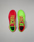 Red and green Wrestling shoes on a gray background