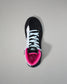 Black wrestling shoe with pink lining on a gray background
