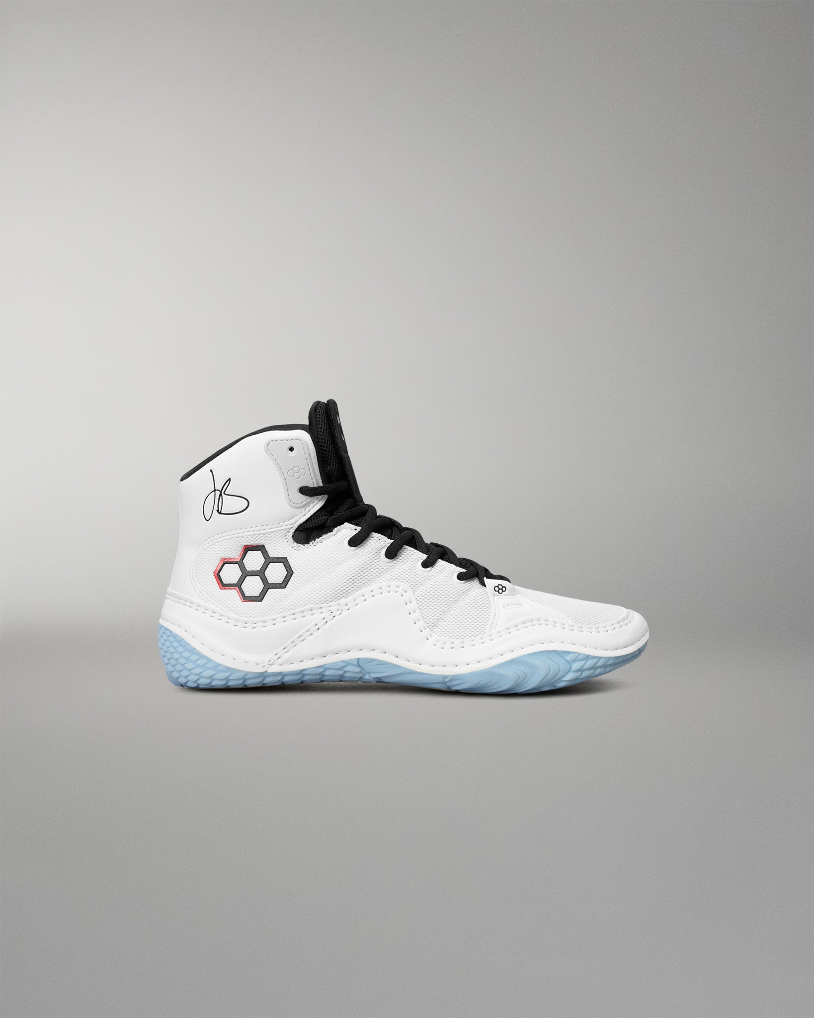 A high-top white wrestling shoes with black laces, a black and red geometric logo on the side, and a light blue textured outsole, shown against a neutral gray background.