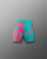 Pink and teal shorts with palm tree design on a gray background