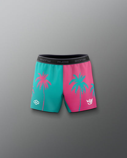Two-tone pink and teal boxer briefs with palm tree design on a gray background