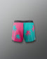 Pink and teal shorts with palm tree design on a gray background
