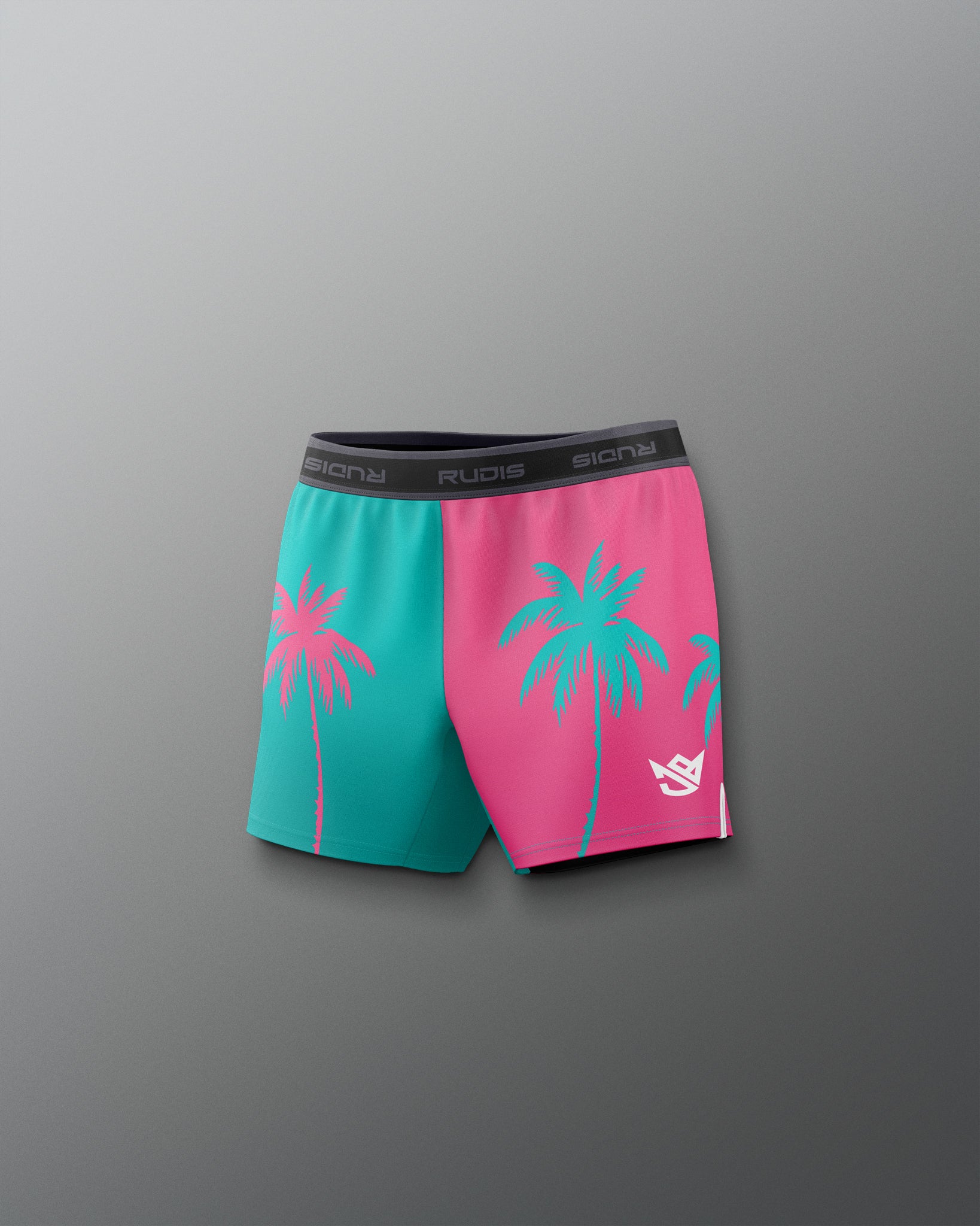 Two-tone shorts with pink and teal palm tree design on a gray background