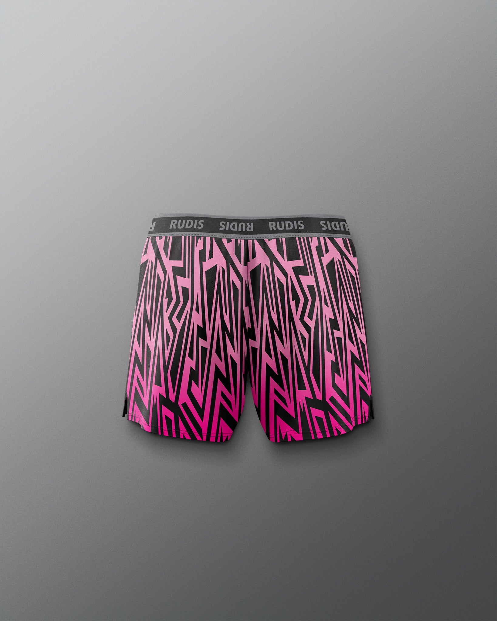 Pink and black patterned boxer briefs on a gray background