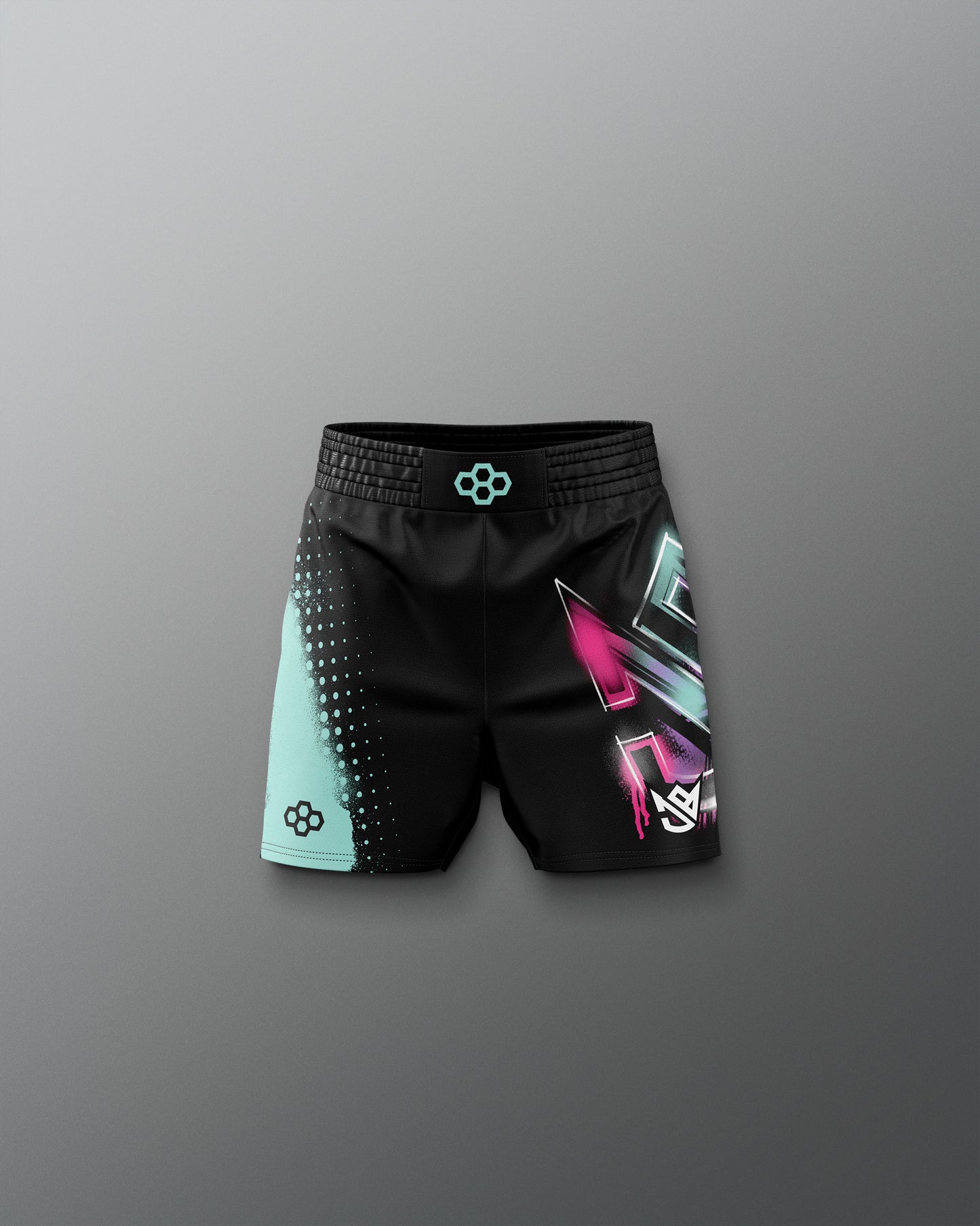Black shorts with colorful geometric design on a gray background