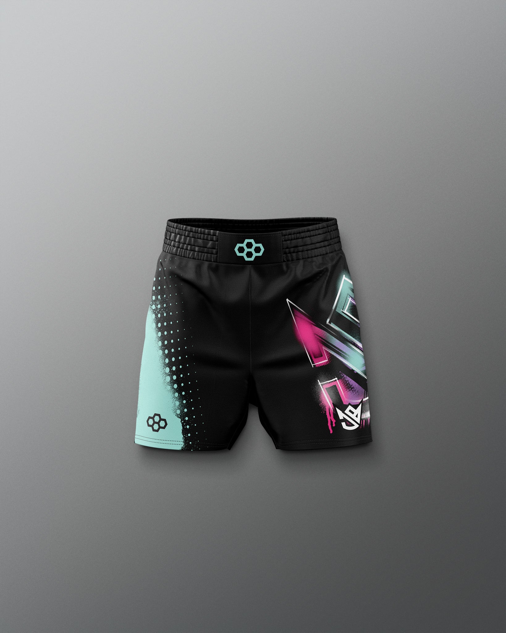 Black shorts with colorful geometric design on a gray background