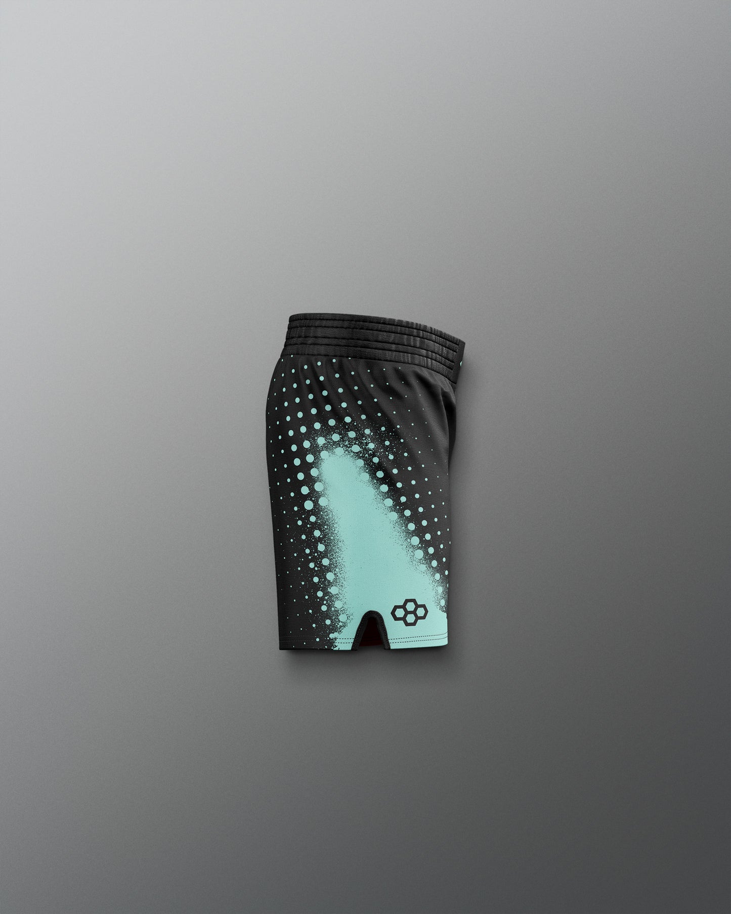 Black shorts with a gradient design on a gray background
