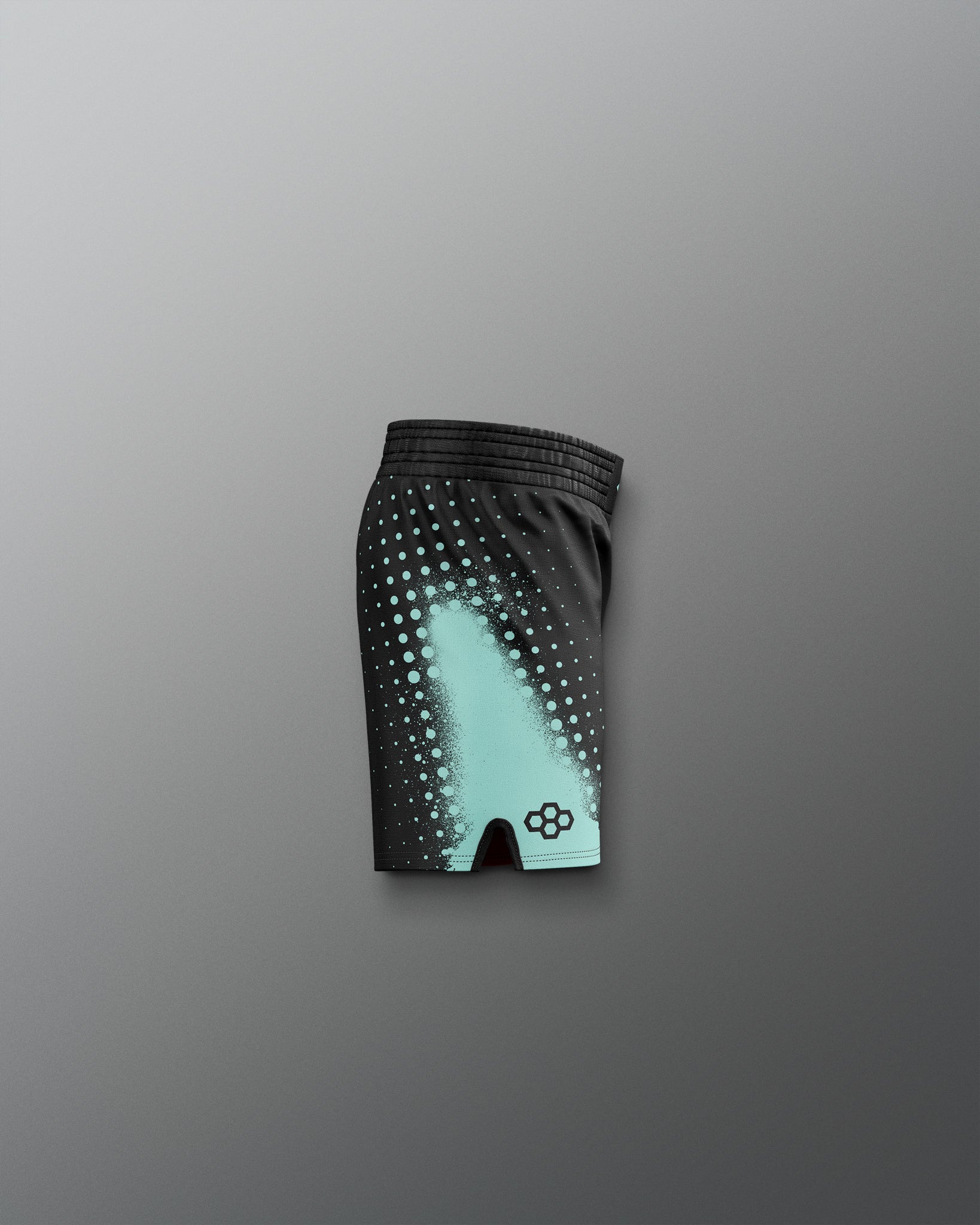 Black shorts with a gradient design on a gray background