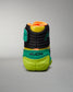 A vibrant pair of black green and yellow athletic shoes featuring a high-top design and branded detailing