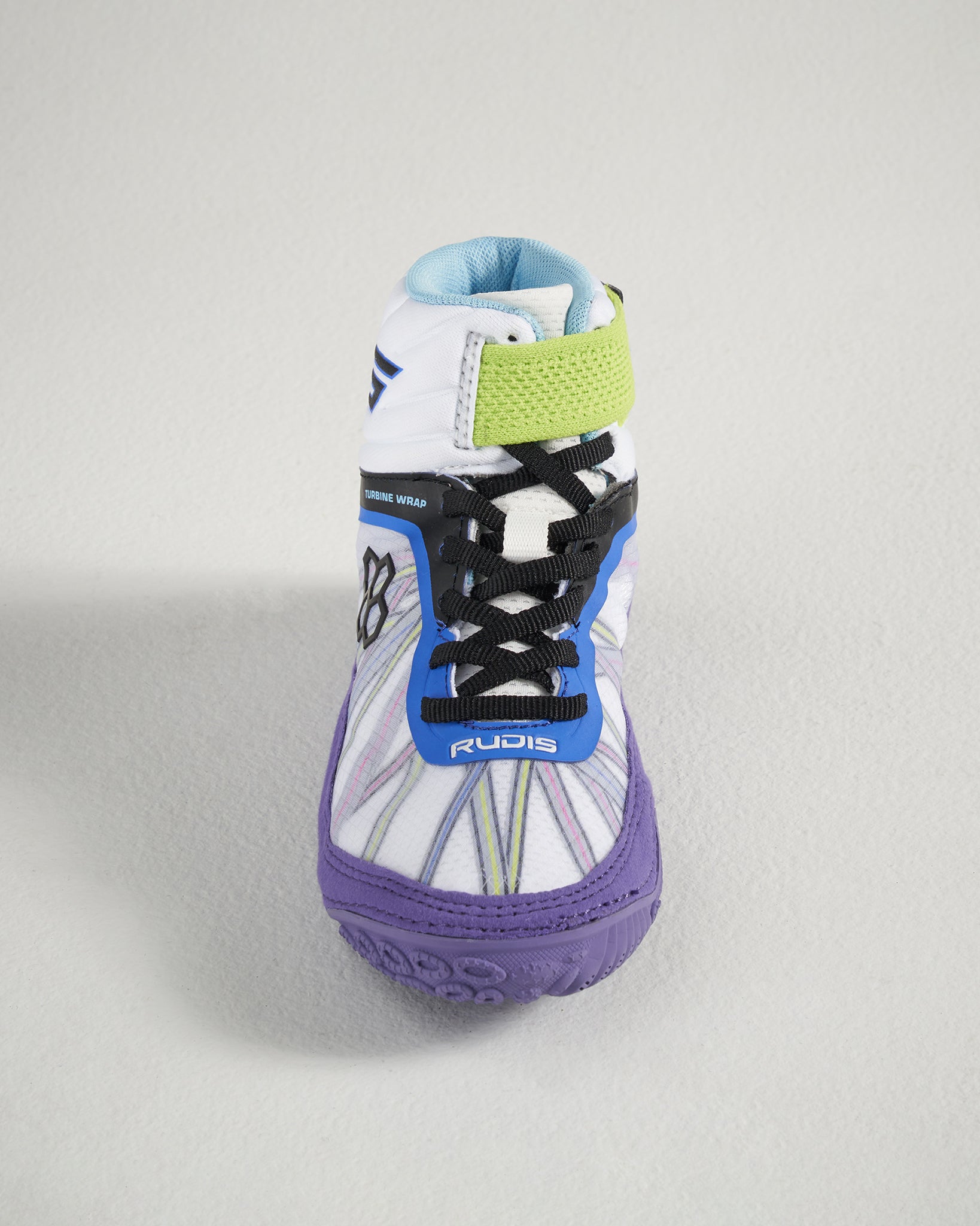 This image features a stylish wrestling shoe showcasing a vibrant design with white blue green and purple tones emphasizing performance and comfort