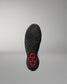 Bottom outsole view of RUDIS Infinity Edge wrestling shoe featuring aggressive traction pattern and red hex grip technology