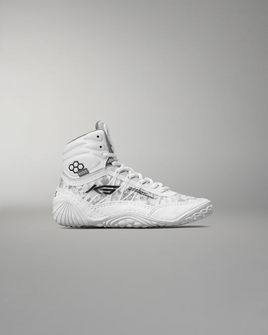 White high-top sneaker with brand logo on a gray background