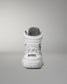 White wrestling shoe with 'RUDIS' branding on a gray background