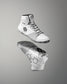 White wrestling shoes with black sole on a gray background