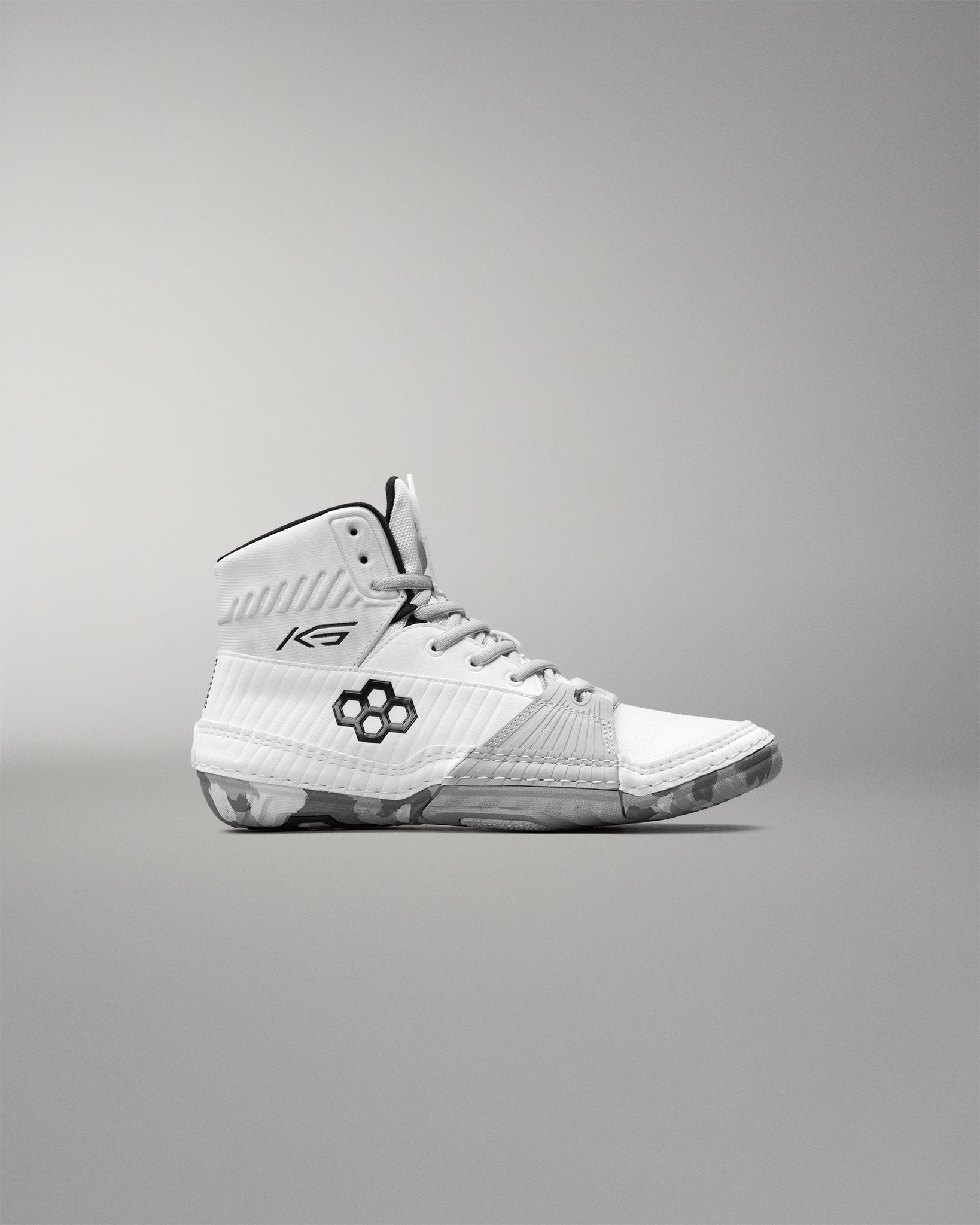 White wrestling shoe with brand logo on a gray background