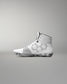 White wrestling shoe with geometric patterns on a gray background
