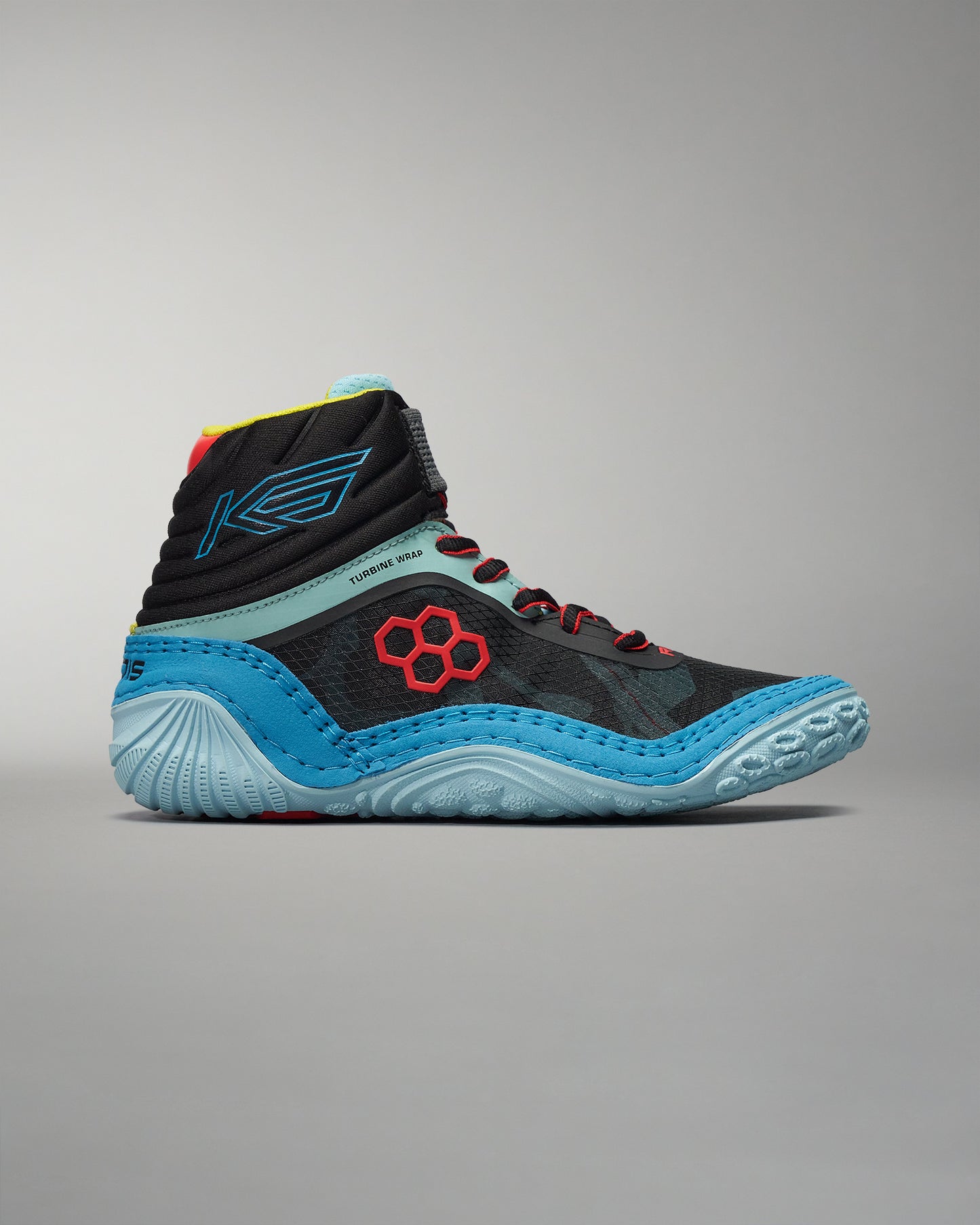 A modern black high-top athletic shoe with vibrant blue and red accents designed for performance and style